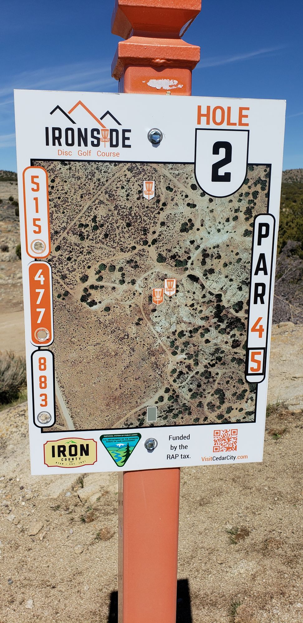 Ironside Disc Golf Course hole sign showing course map and par info